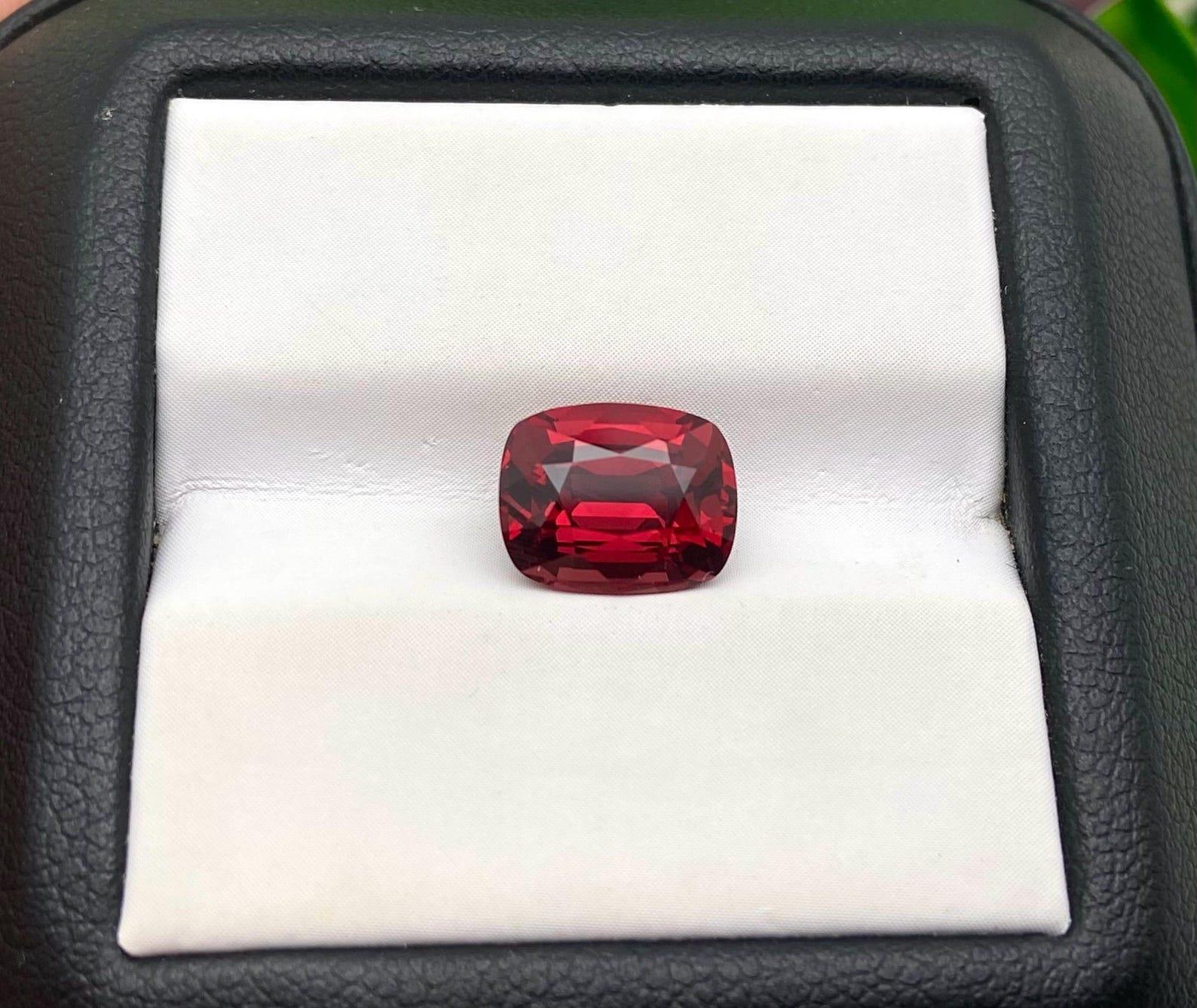 Natural Garnet Pyrope-Almandine loose gemstone

Laboratory certified AGL
Gemstone Color: Orangish Red
Gemstone Type: Pyrope-Almandine Garnet
Gemstone size: 9.15x7.29x5.24 mm
Cut Grade: Very Good
Clarity/Grade: Loupe Clean
Gemstone Shape: Cushion