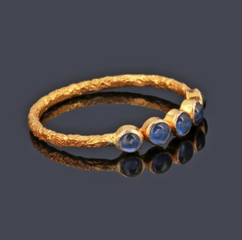Feminine and fragile! Made with 0.46 Carat Coral Gemstone in 18k Yellow Gold Ring, this ring is available in varied colours! The chiseled gold bezel decorated with four circular stones to add richness to your looks! 

Specifications

Dimensions: 4