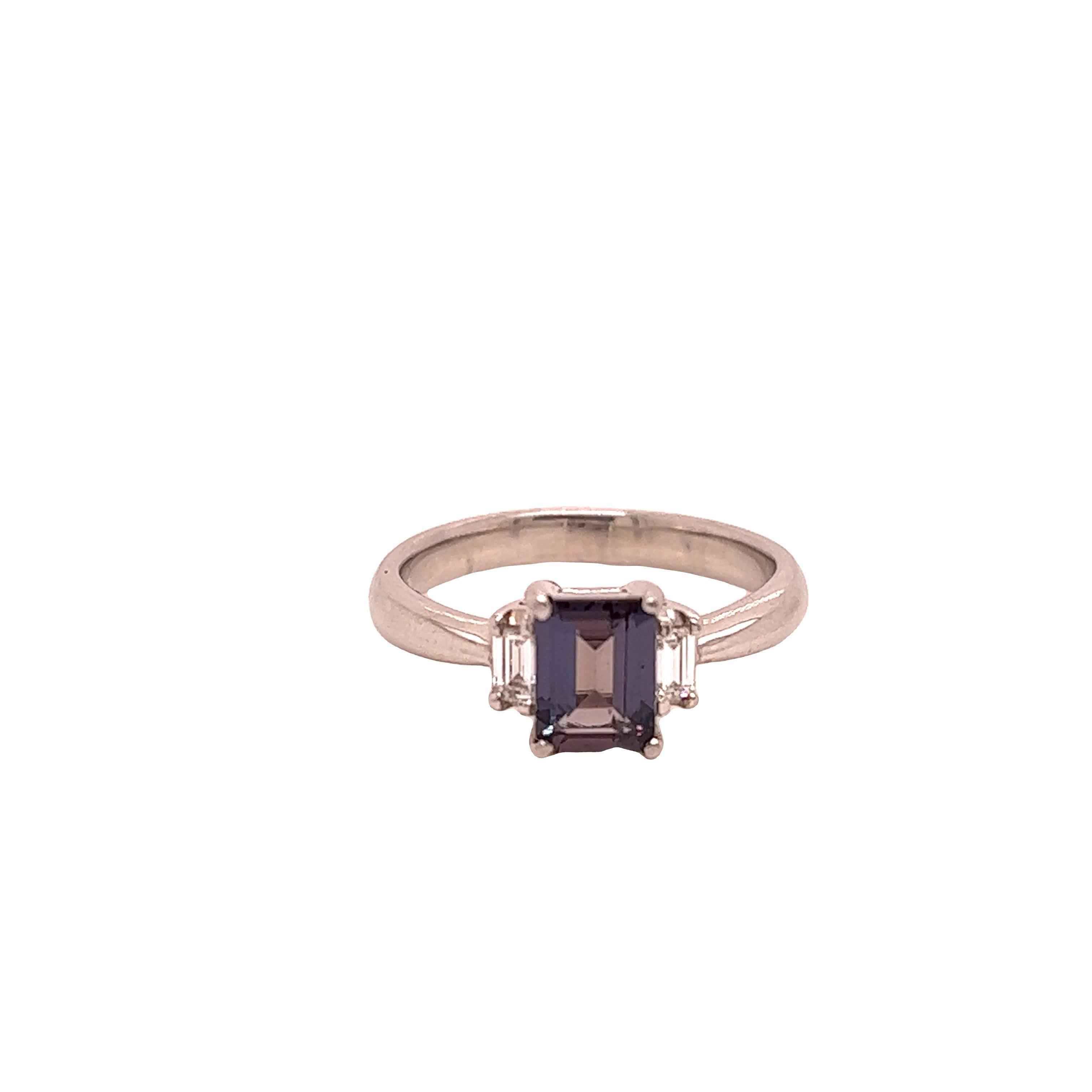 This is a gorgeous natural AAA quality E-Cut Alexandrite set in a vintage platinum setting. This ring features a natural 0.96 E-Cut alexandrite that is certified by the Gemological Institute of America (GIA). The ring is a true showstopper.