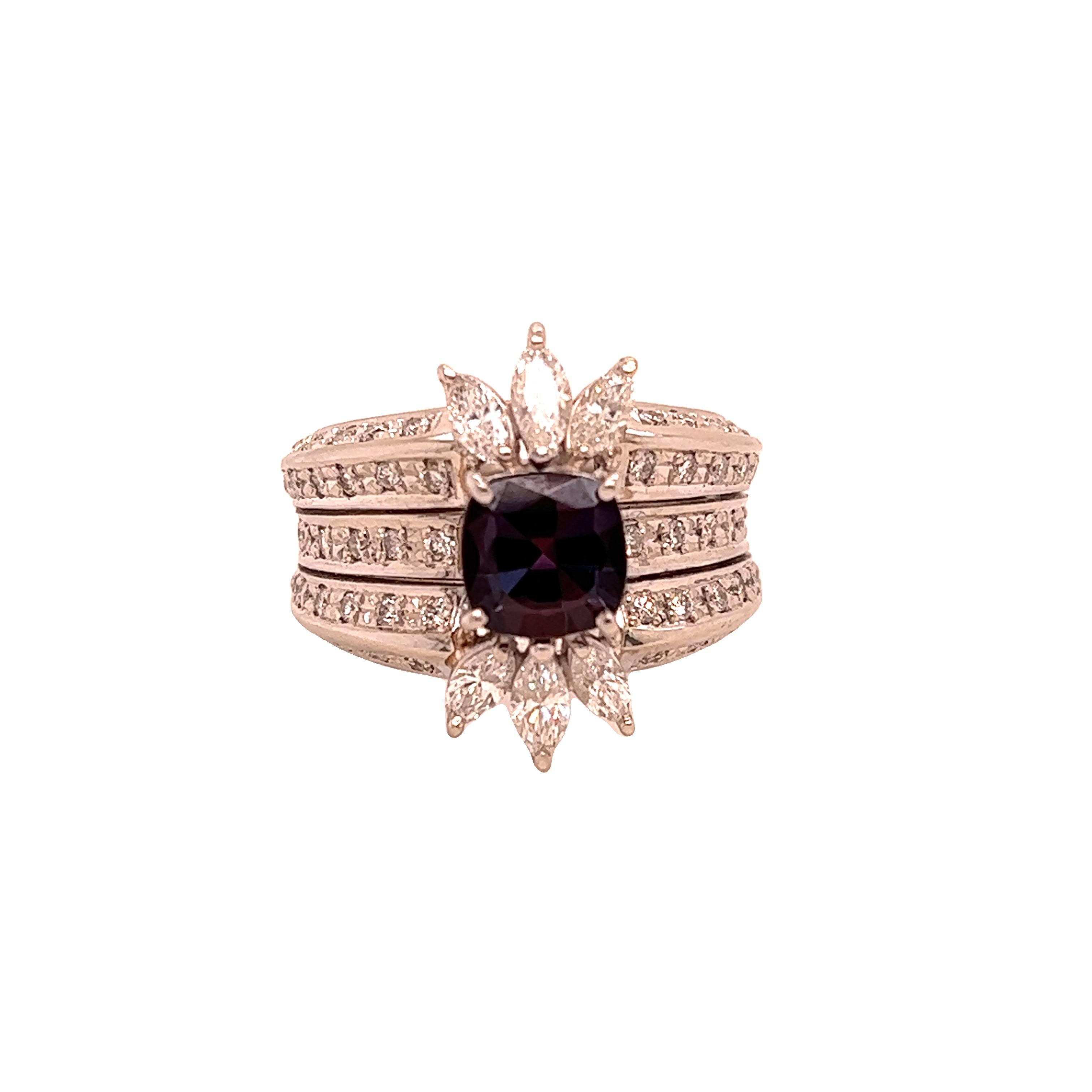 This is a gorgeous natural AAA quality cushion Alexandrite surrounded by dainty diamonds that is set in a vintage platinum setting. This ring features a natural 1.38 carat cushion alexandrite that is certified by the Gemological Institute of America