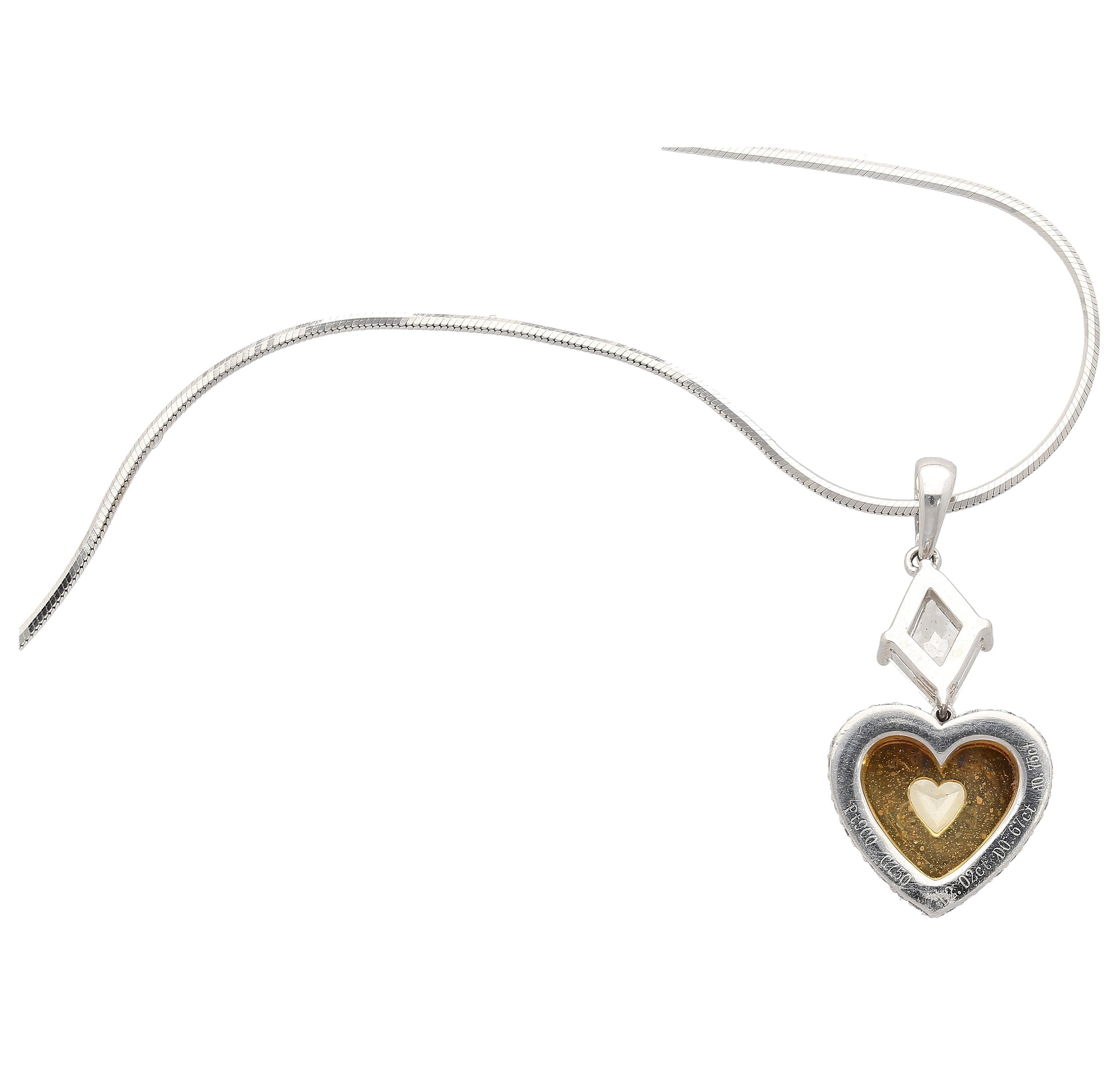 Natural Fancy Yellow Diamond Heart Platinum Necklace. 

This pendant necklace features a natural fancy yellow 2.02 carat heart-shaped diamond center stone, secured in a prong setting. The heart-shaped yellow diamond is GIA-certified.  This yellow
