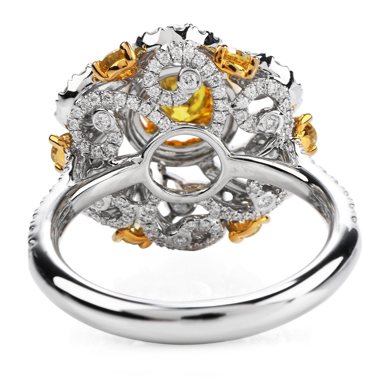 The deep yellow color on this Flower inspired Diamond Engagement ring, 

Crafted in solid 18K white & yellow gold, the center is adorned by a GIA certified fancy vivid Yellow Diamond, round-shaped, prong cut, weighing in a total of 0.64 carats (I1