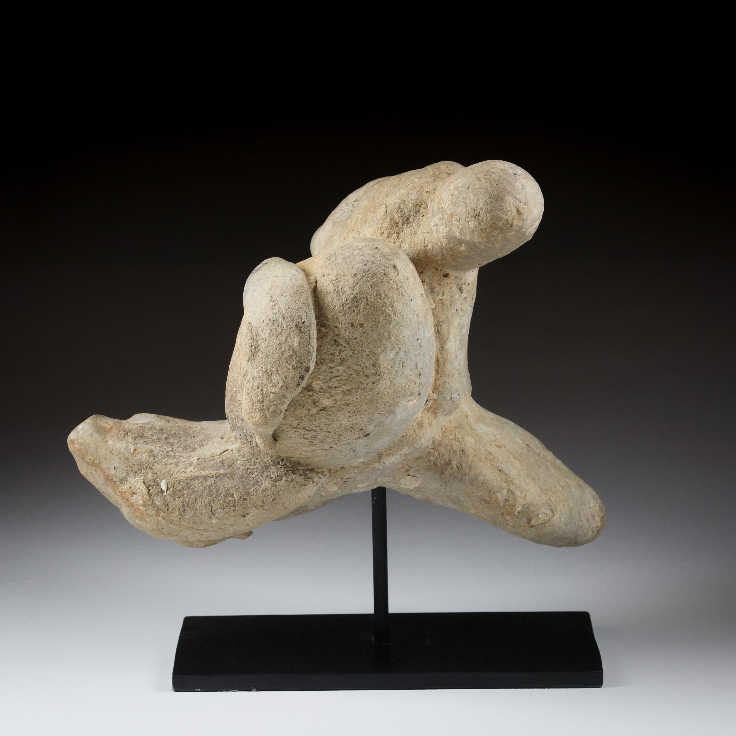 A Gogotte Formation - Running
Fontainbleau, France 
Oligocene Period
 Light Weathering Measurement Inc Stand. 
Gogottes are beautiful and beguiling mineral formations. They are rare and entirely natural result of calcium carbonate binding with