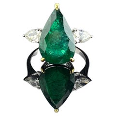 Anillo de compromiso de tres piedras con diamante esmeralda pera certificado de 5,7 quilates