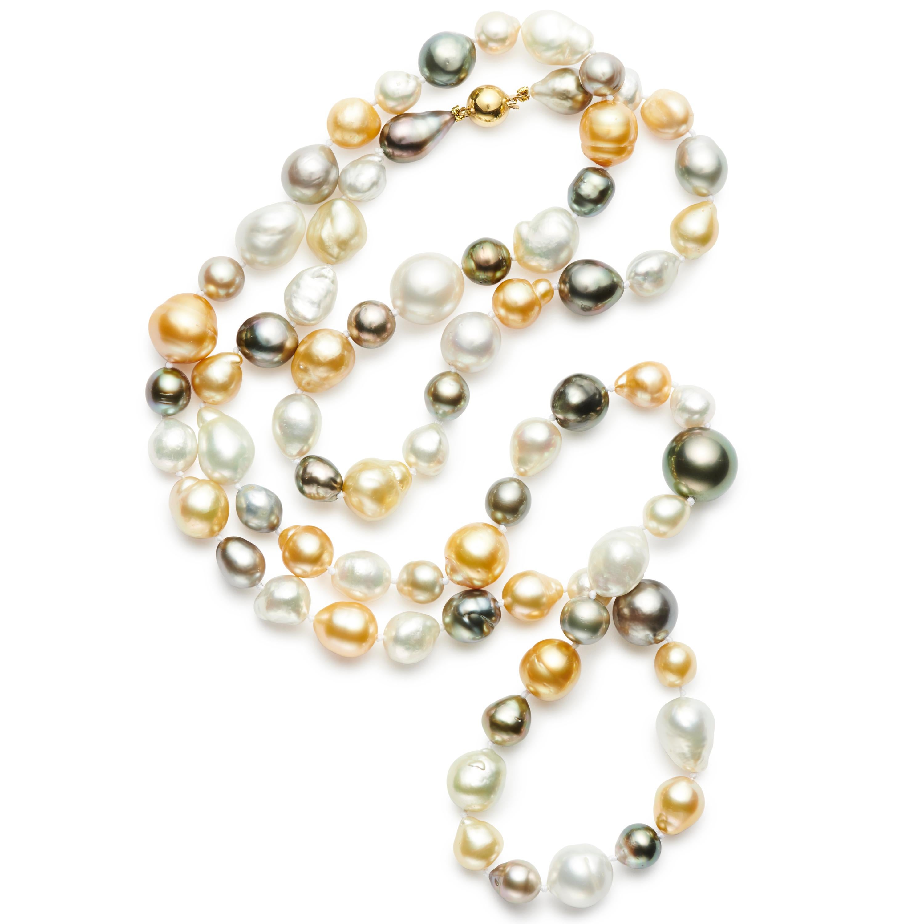 A magnificent mix of styles, sizes and hues make up this 39” beautifully hand-knotted strand of pearls. Natural Golden, Multi-Colored Tahitian, White round and Baroque South Sea Pearls are secured with an 18kt Gold ball clasp and can be worn doubled