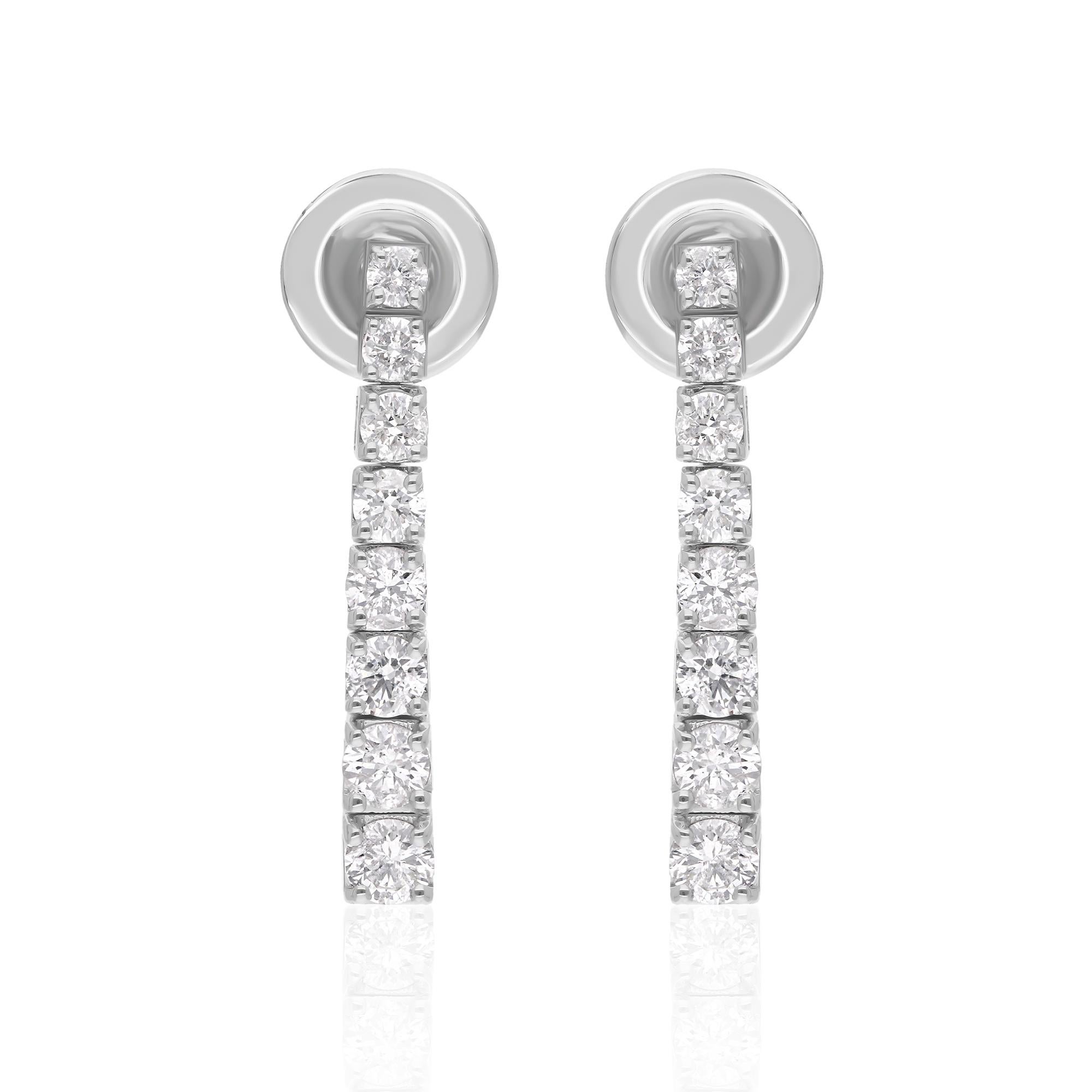 Set in lustrous 14 Karat White Gold, these earrings exude luxury and refinement. The precious metal provides the perfect backdrop for the diamonds, enhancing their natural brilliance and ensuring durability for years to come. Handcrafted with