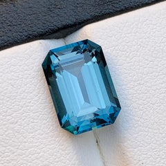 Natürlicher gräulicher Farbton blauer Londoner Blautopas 7,43 Karat Smaragdschliff Lose Edelstein