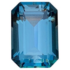 Natural Grayish Hue Blue London Blue Topaz 7.43 Carat Emerald Cut Loose Gemstone