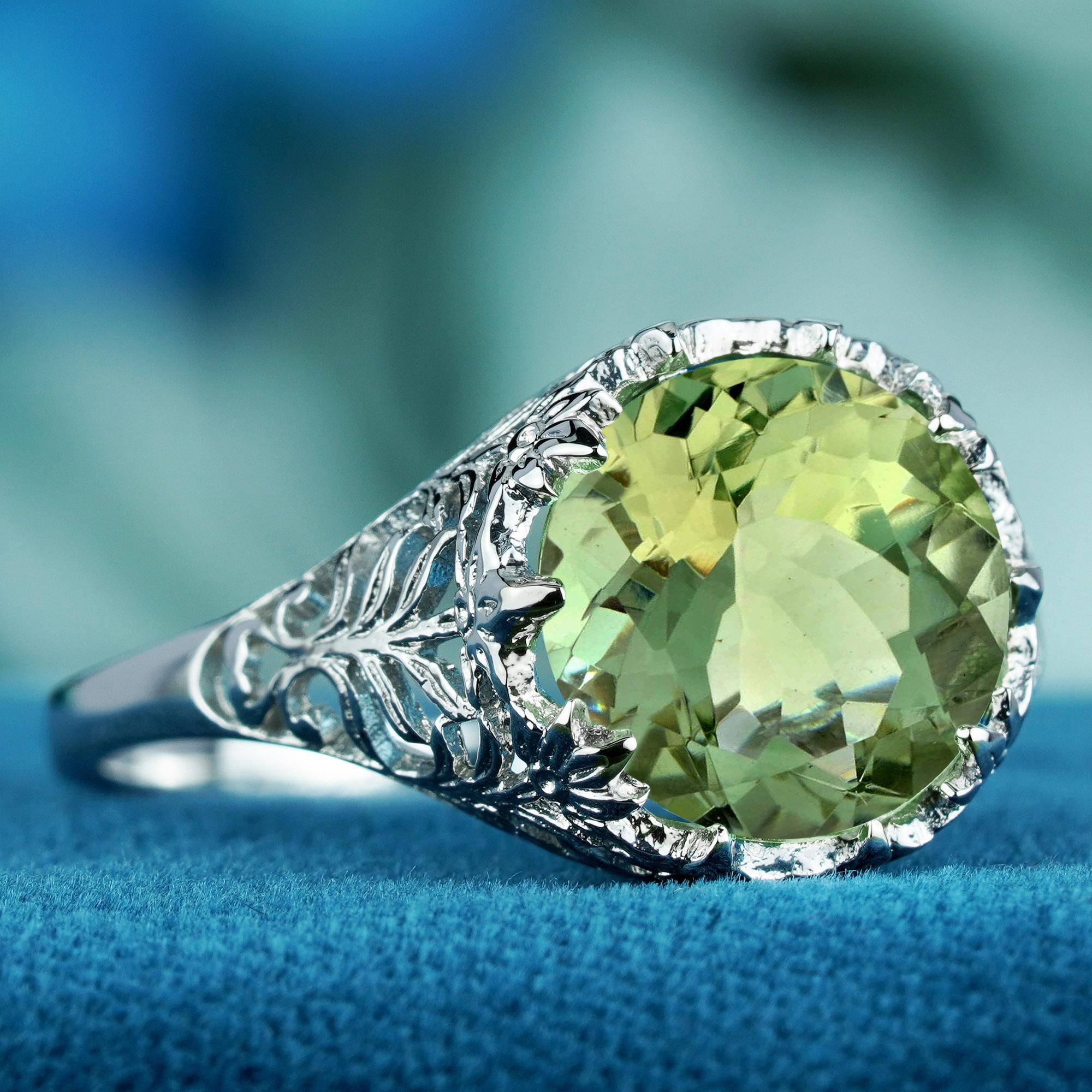 Elevate your style with our natural green amethyst vintage style floral motif ring in solid 9K white gold. This exquisite piece features a stunning approx. 3-carat natural green amethyst, enveloped in intricate filigree work that showcases a