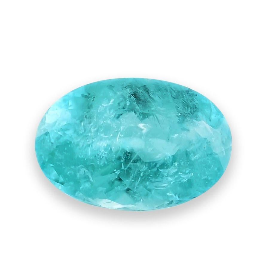 Scopri la luminosa bellezza di questa tormalina brasiliana Paraiba naturale, del peso di 0,80 carati. Con un'accattivante tonalità verde-blu, questa gemma di forma ovale presenta un taglio a brillante modificato che ne esalta il colore vibrante e lo