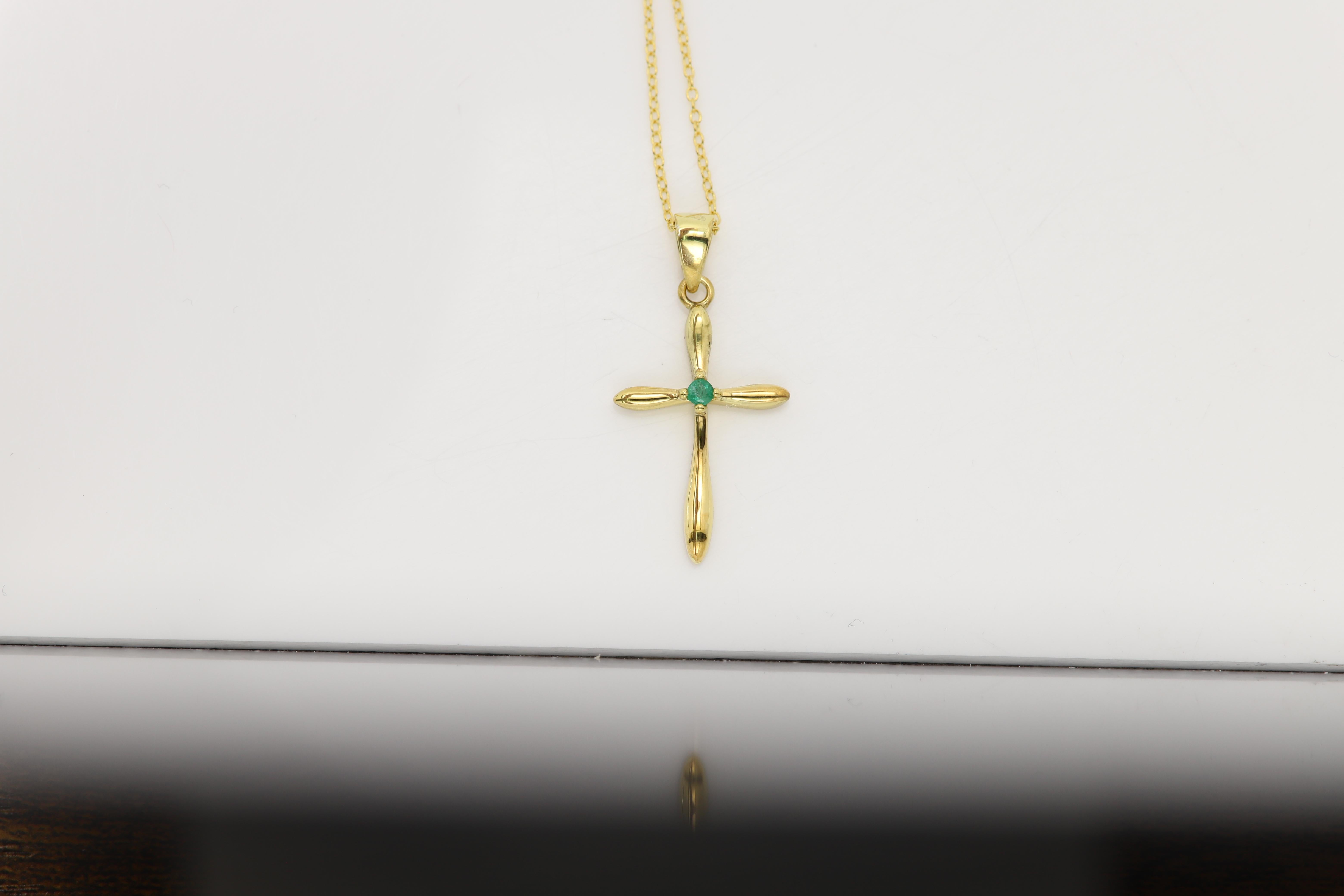 New Cute Cross Pendant
Sterling Silver 925 plated with Yellow Gold
approx weight 2.8 grams 
Chain: 18' inch
Size: approx 1' inch tall
Center stone: Natural Emerald 2.0mm approx 0.04ct - 0.05ct
Nice Green Color
+ Gift Box