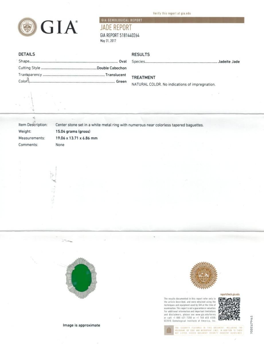 Discover the luxurious allure of this 18K white gold ring, showcasing a mesmerizing 14.70-carat natural green jadeite jade, elegantly framed by 2.70 carats of sparkling diamonds. With its rich, vibrant green hue and refined craftsmanship, this piece