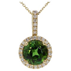Natural Green Oval Tourmaline and White Diamond 2.15 Carat TW Gold Pendant
