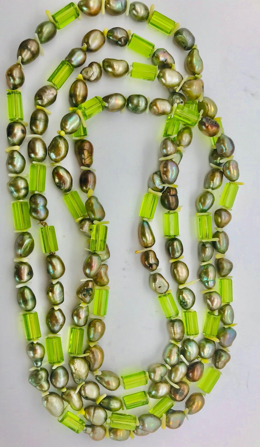 Contemporary Natural green Pearls and  Peridot Stones with Silver clasp, by Sylvia Gottwald For Sale