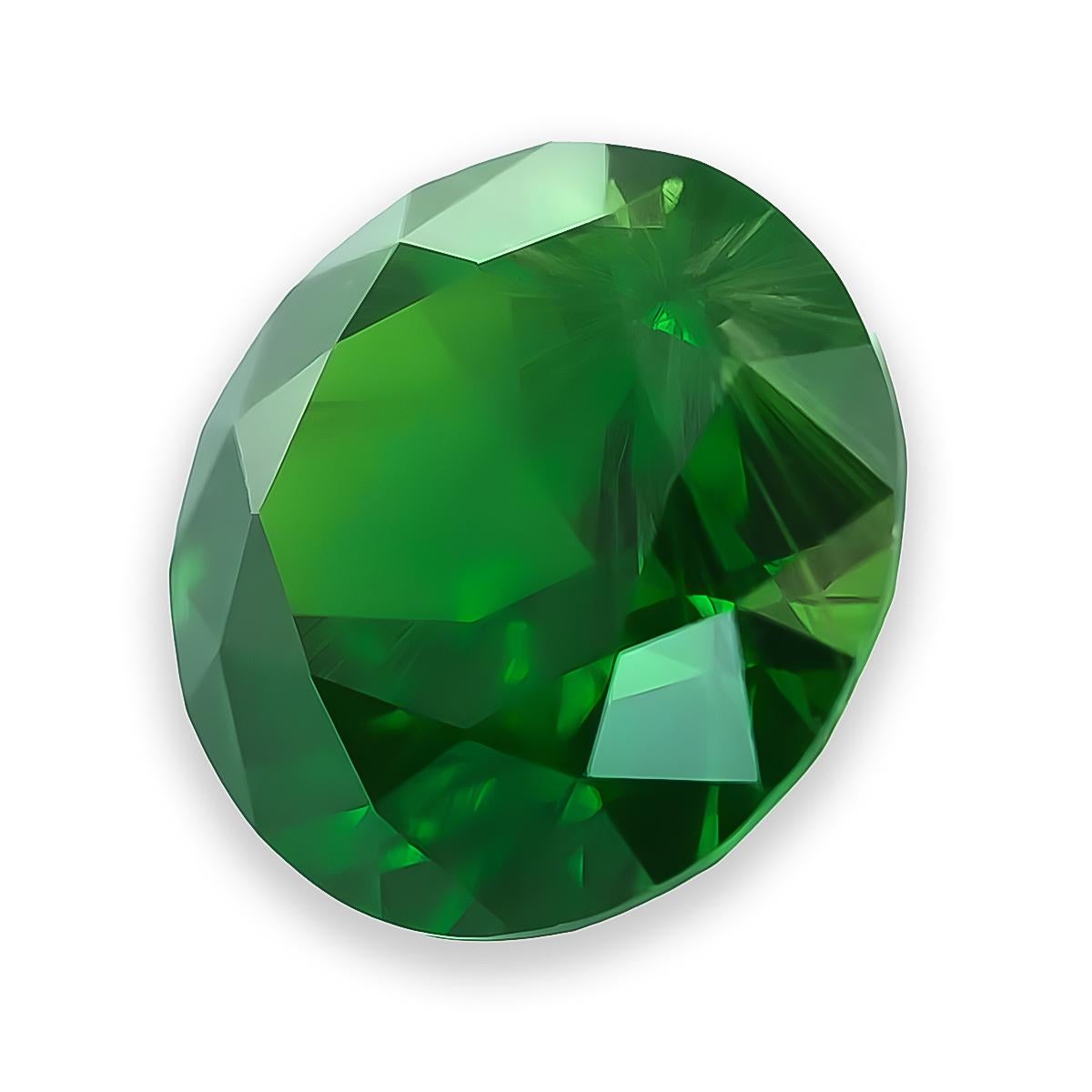 This exquisite Russian demantoid garnet captivates with its vivid green hue and exceptional brilliance. Featuring a brilliant/step cut, this rare gemstone exhibits outstanding fire, making it a prized choice for collectors and fine jewelry