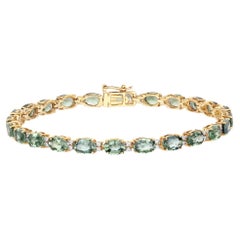 Bracelet tennis en or jaune 14 carats avec saphir vert naturel et diamants 12,80 carats