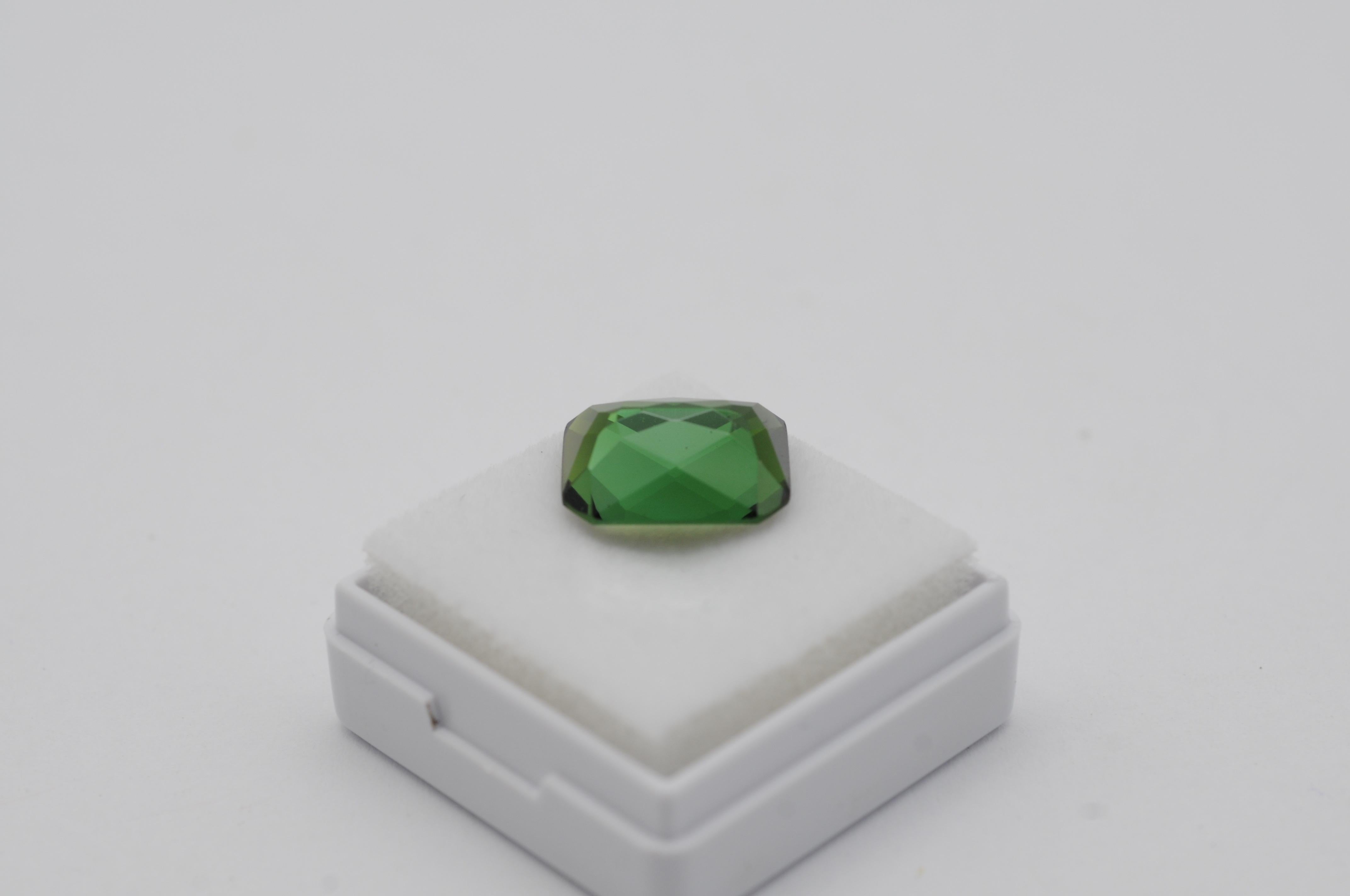 Natural Green Tourmaline – 5.9 ct

A stunning natural tourmaline with an intense green hue. Weighing 5.9 ct, this eye-clean gemstone is of exceptional quality.

A gemstone report is included, confirming the authenticity and characteristics of the