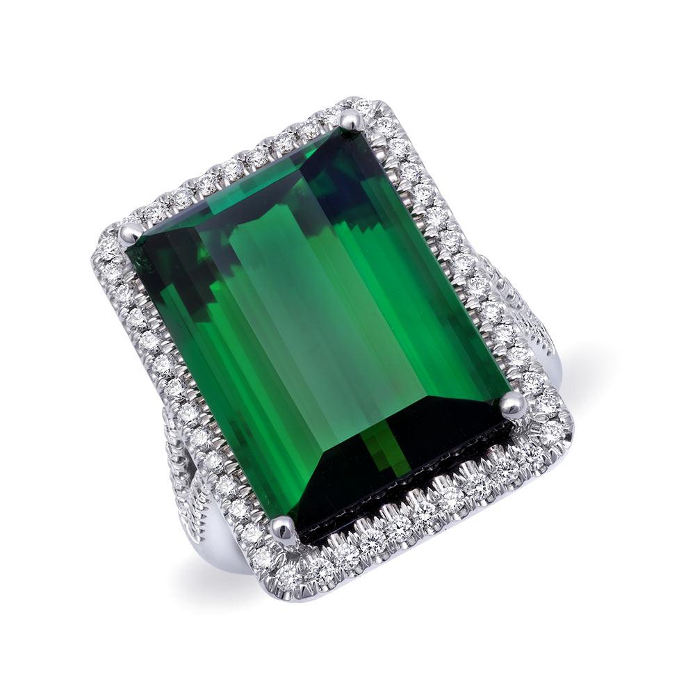 Discover the exquisite beauty of natural green tourmaline with this stunning 14K white gold ring. Accentuated by sparkling diamonds, this piece showcases exceptional craftsmanship and the lush vibrancy of the gemstones. Perfect for adding a touch of