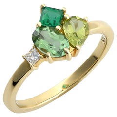 Tormalina verde naturale, peridoto, smeraldo, diamante da 1,03 carati incastonati in un anello in 14KYG