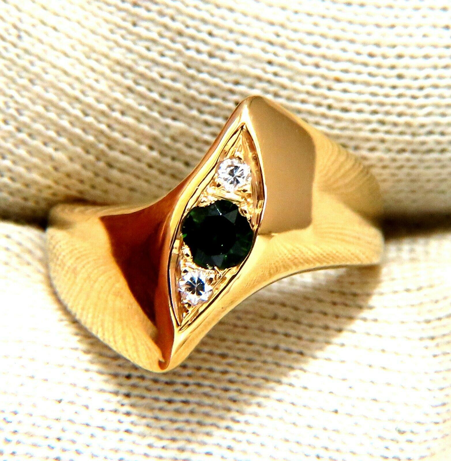 .20 carat natural Green Garnet tsavorite ring.

Mint green, clean clarity and transparent.

Round full cut brilliant.

.10 carat natural round diamonds H color vs2 clarity.

14 karat yellow gold.

Total weight 6.7 g

Ring is 15.8 MM wide

Depth of