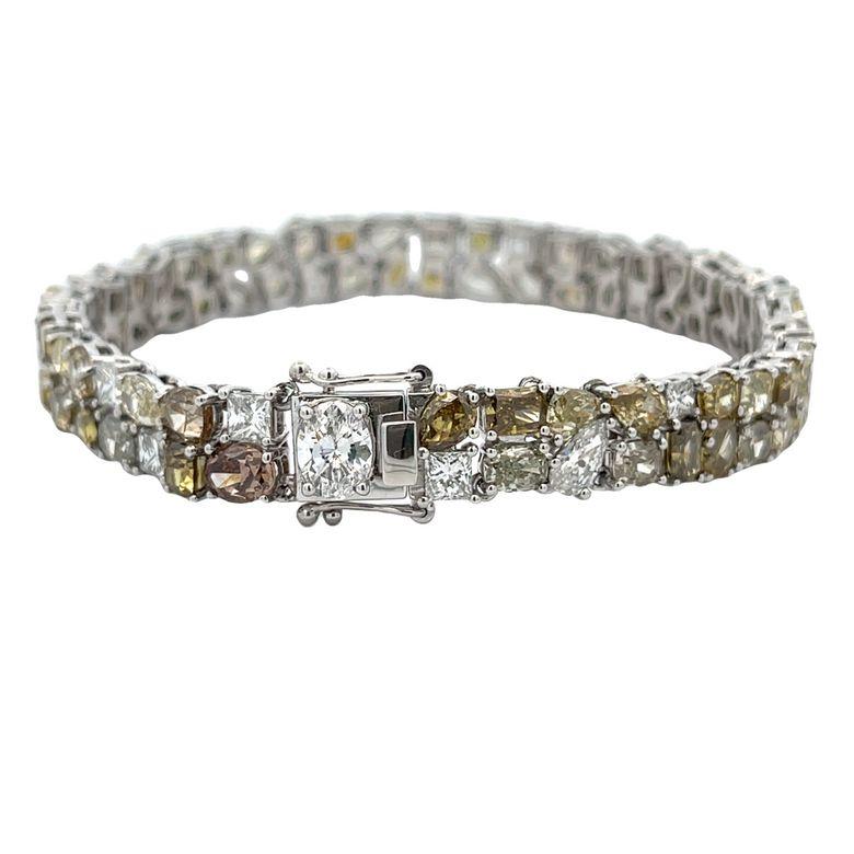 Discover the allure of timeless sophistication with our exquisite Diamond Elegance Bracelet, a standout piece that enhances any outfit with its radiant charm.  This bracelet is a true testament to craftsmanship, designed as a one-of-a-kind creation