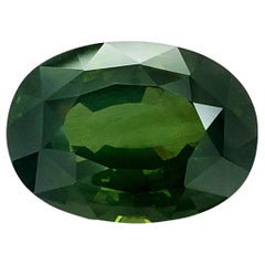 Gemma di zircone verde naturale 43,53 carati con rapporto GIA / JupiterGem