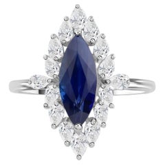 Anillo de Cóctel de Zafiro Azul y Diamantes de Corte Marquesa Halo Natural Oro Blanco 18k