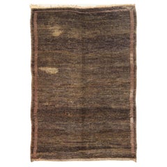 Tapis marocain naturel noué à la main avec un design massif dans des tons de brun