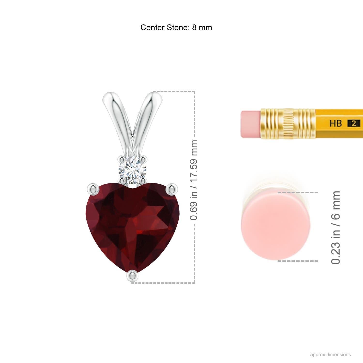 Captivating with its deep red hue is the heart-shaped garnet in prong-setting. It is topped with a sparkling diamond accent and linked to a lustrous V-bale. This garnet pendant is crafted in 14k white gold.