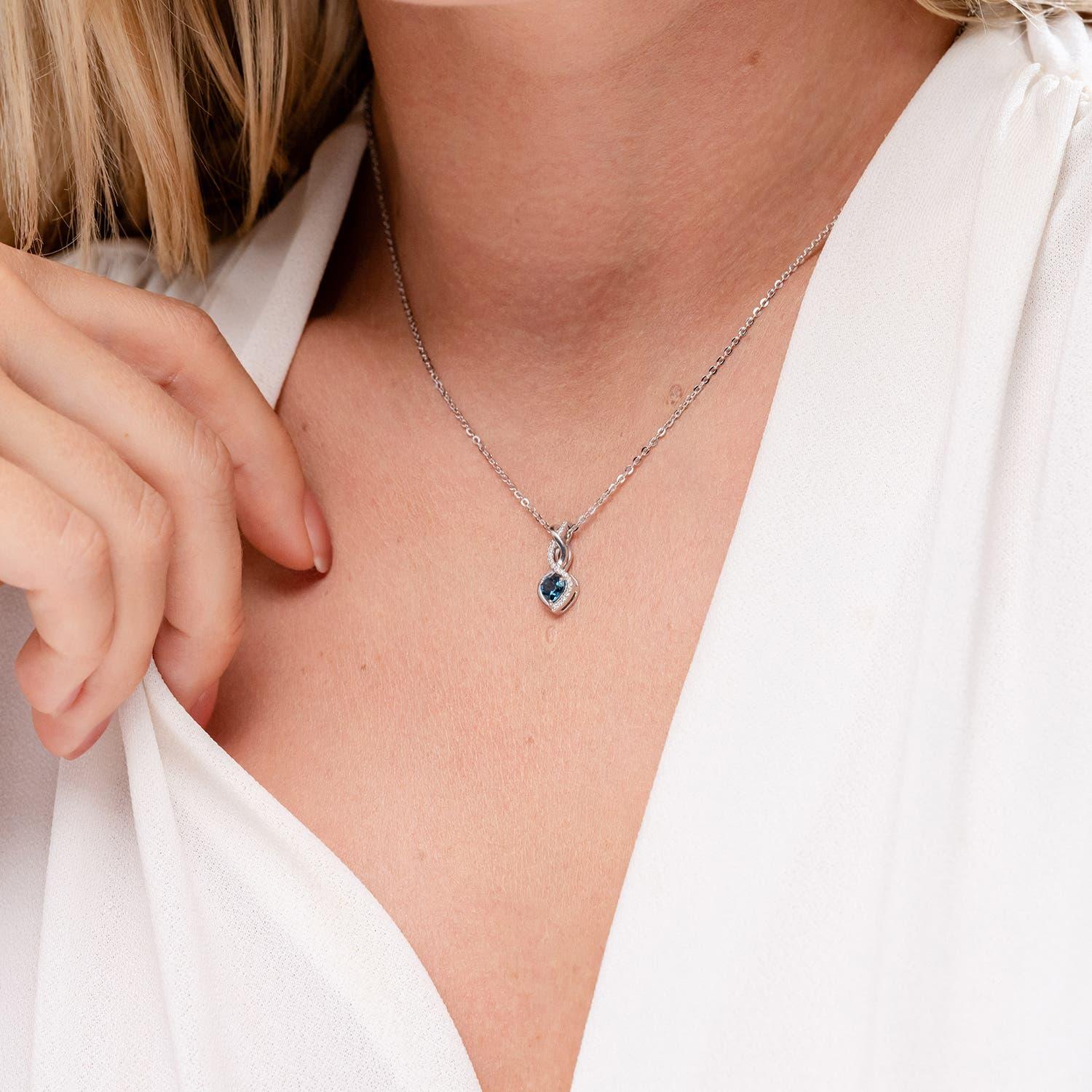Modern Natural Heart-Shaped London Blue Topaz Pendant with Diamond in 14K White Gold For Sale