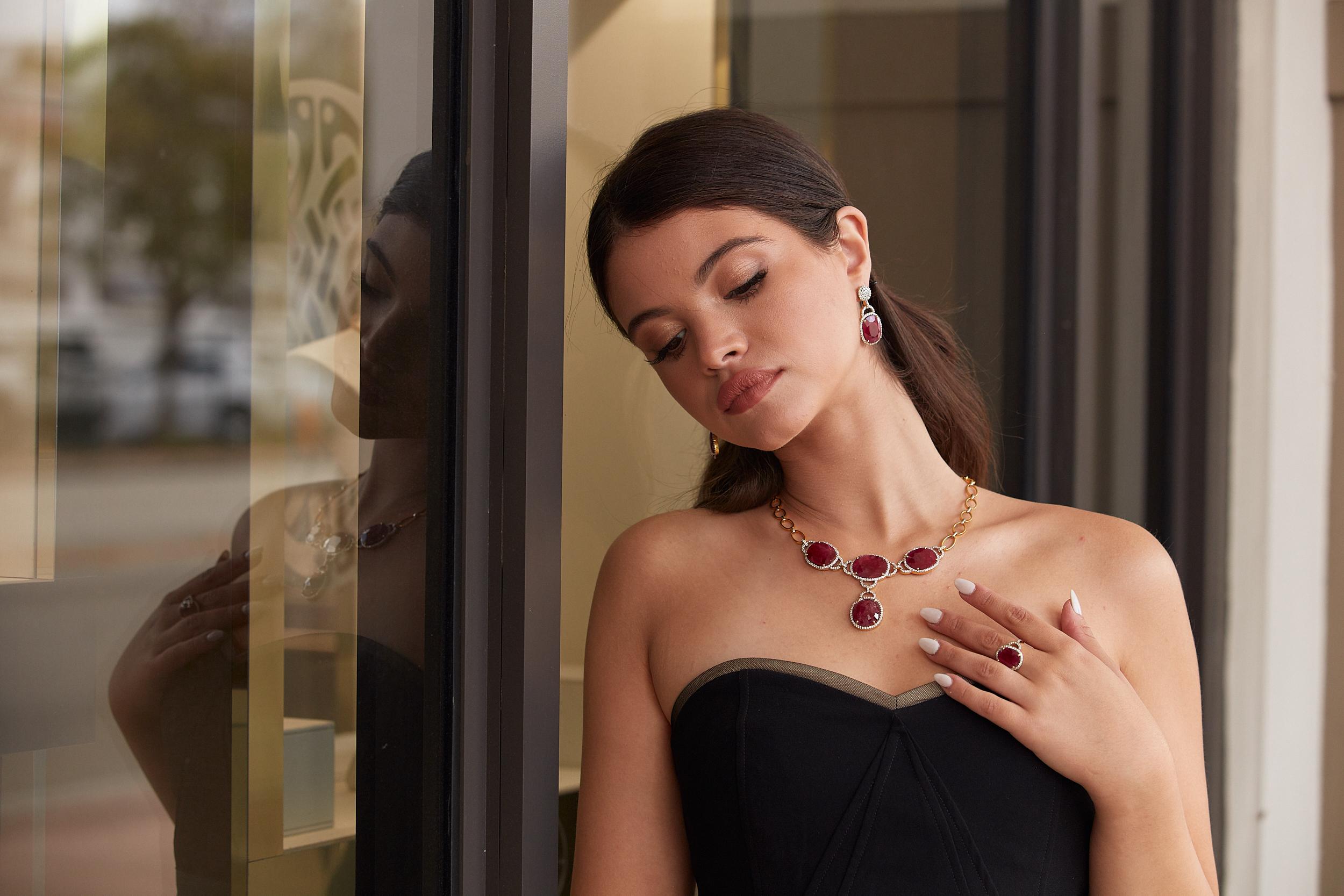 Tresor Beautiful Necklace feature 56.60 total carats of Ruby & 2.19 carats of Diamond. The Necklace is an ode to the luxurious yet classic beauty with sparkly gemstones and feminine hues. Their contemporary and modern design make them perfect and