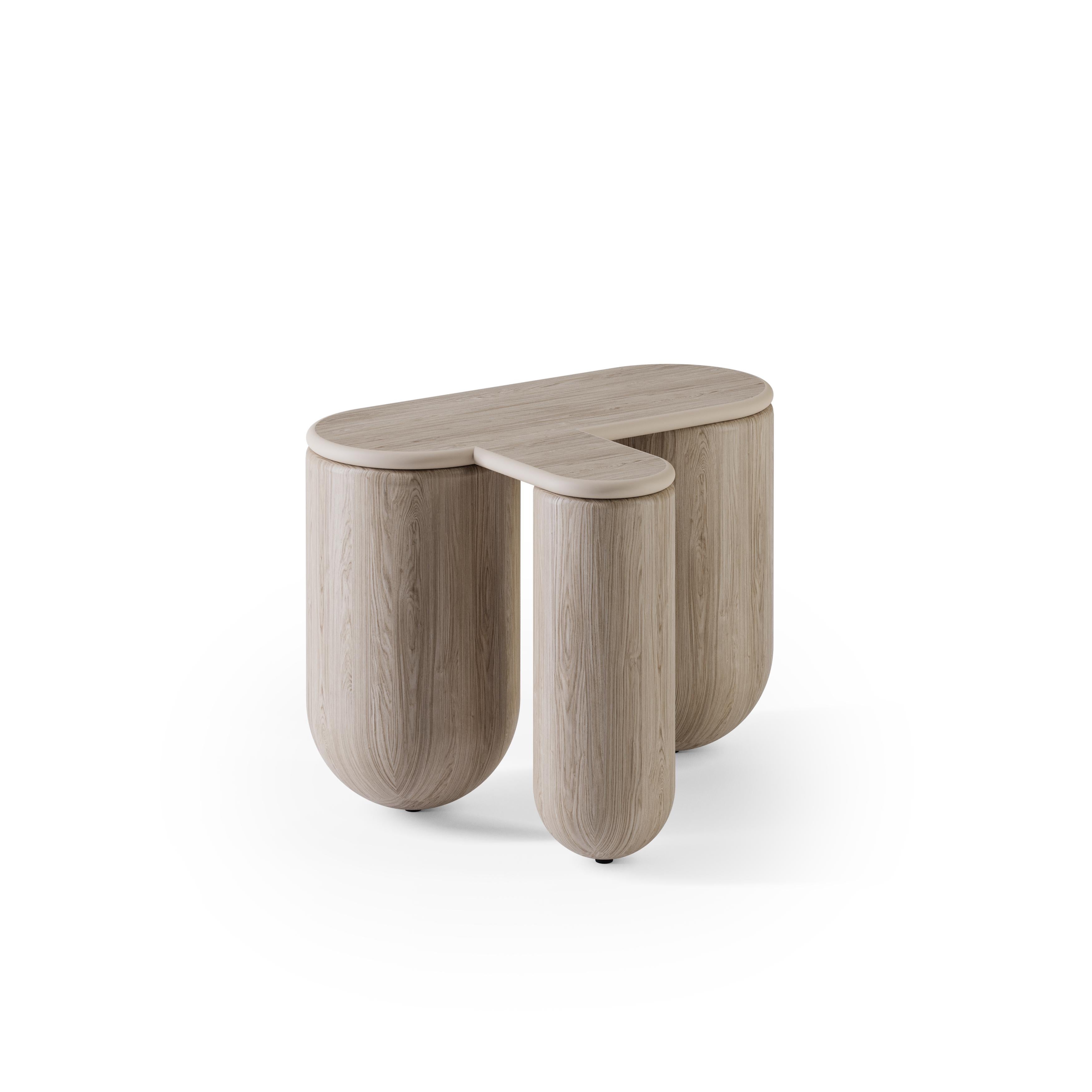 Natural Hello Coffee Table 1 by NOOM
Dimensions: W 63 x D 48 x H 44 cm 
Materials: Ashwood legs with tabletop in wood veneered MDF.

The HELLO coffee table, with its gently rounded shape, is not just a piece of furniture. It's a statement. Crafted