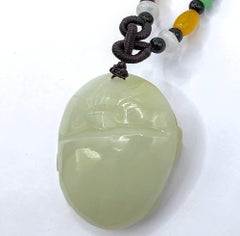Natural Hetian White Jade Pixiu 貔貅 Ruyi Pendant with Golden-Brown Skin