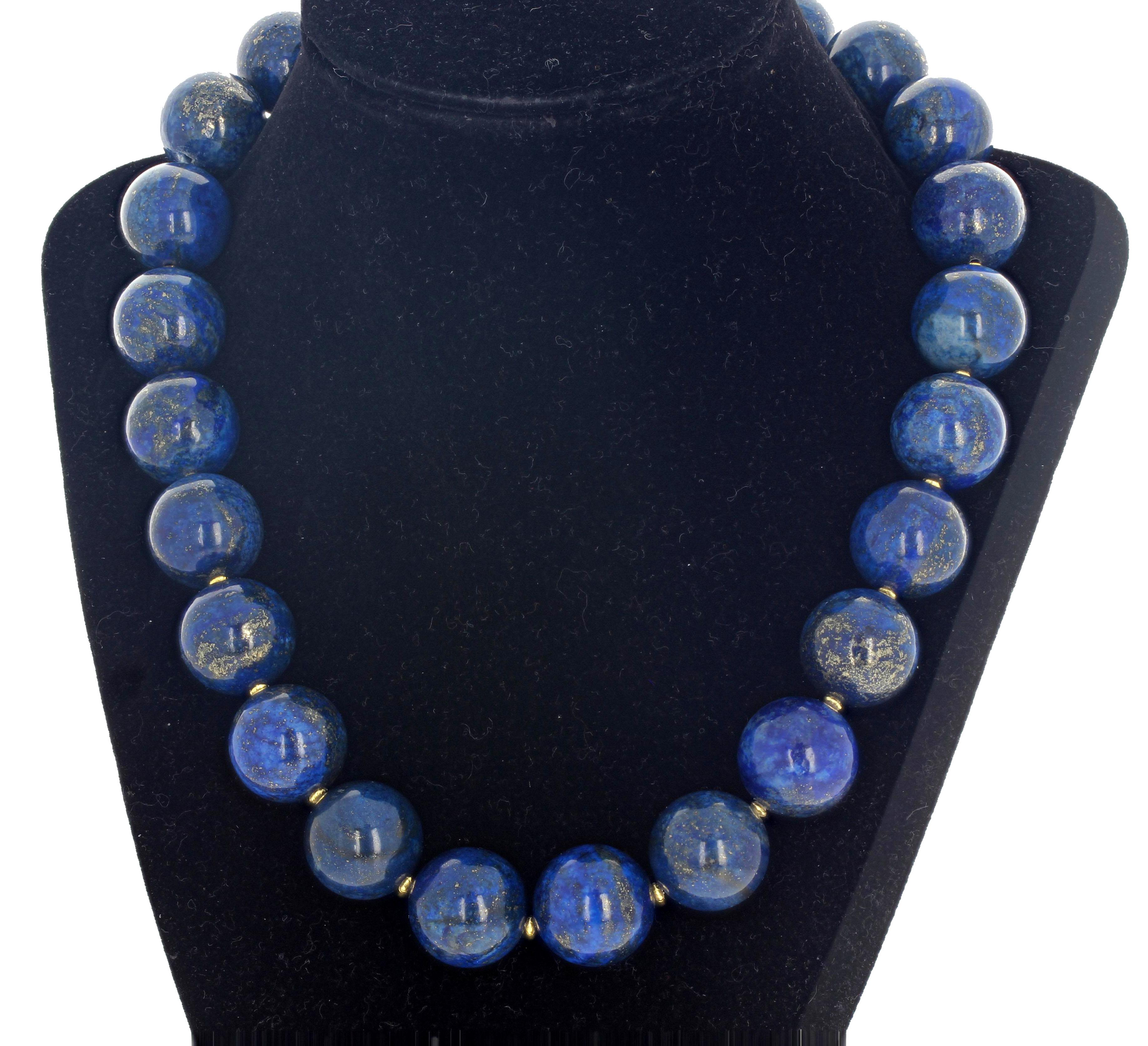 These lovely natural glowing Lapis Lazuli are 18mm round and are enhanced with tiny gold plated rondels set in this 18.5 inch long necklace.  These beautiful gemstones show off the goldy flecks of the natural gemstone quite beautifully. 