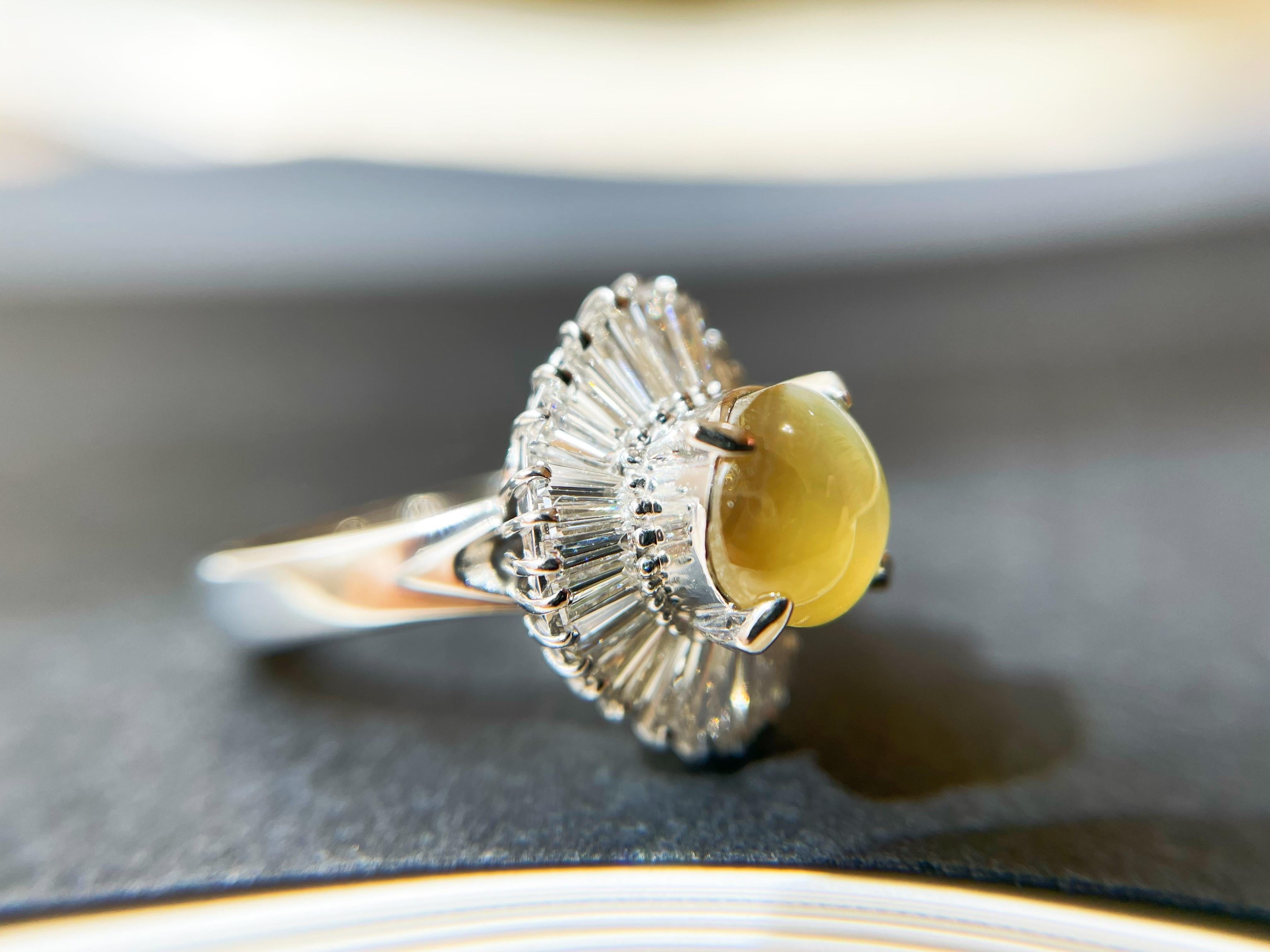 Oval Cut Natural Honey Color Chrysoberyl Cat's Eye Ring with Diamonds in Platinum For Sale