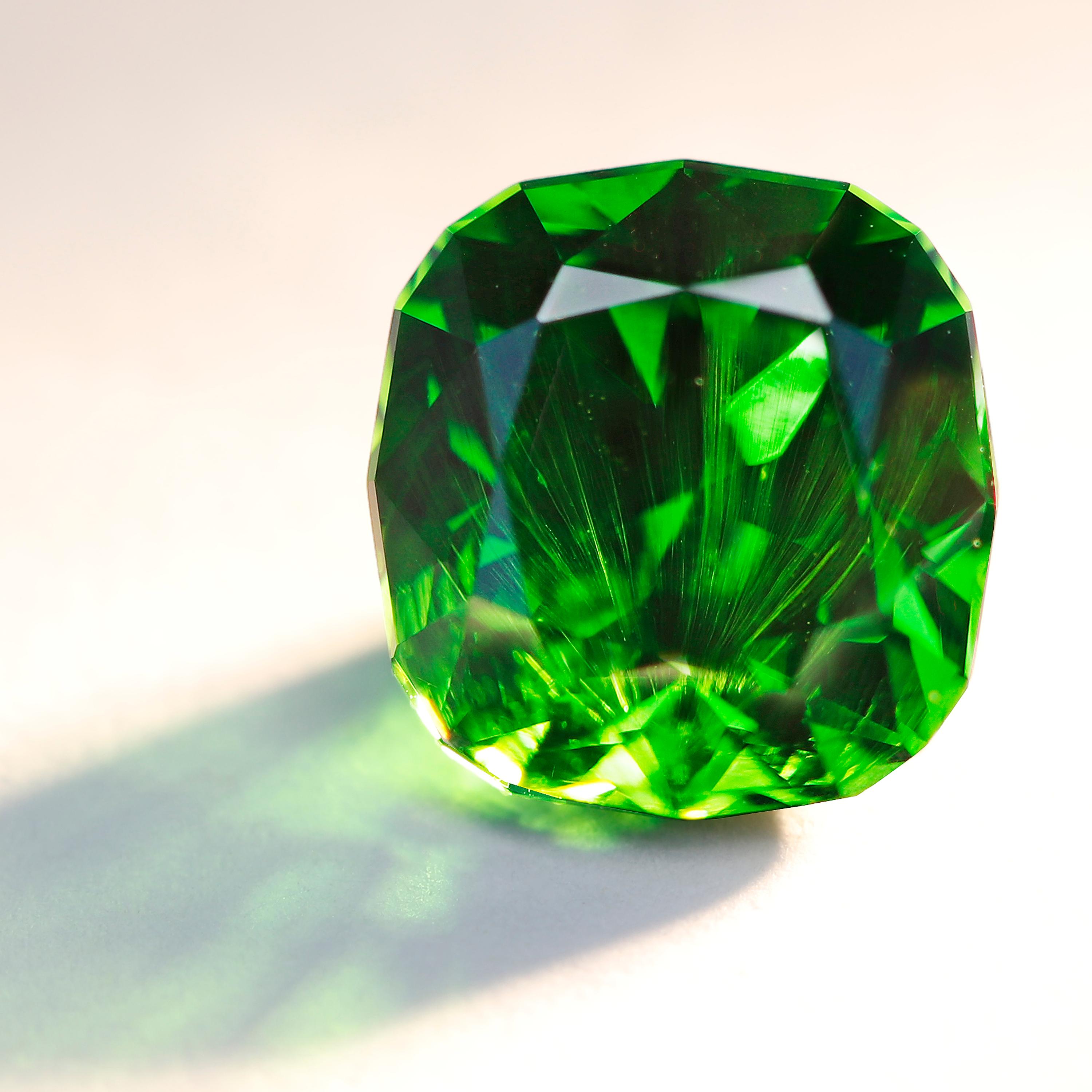 Ural Mountains of Russia is the most important and consistent source of the rarest variety of Garnets - Demantoid.  
The stones from this region are famous for their vivid green hue, high dispersion and characteristic horsetail inclusion. 