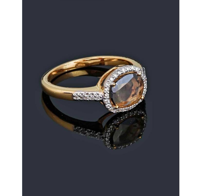 This ring is made of 14k yellow gold and is set with dazzling ice diamonds. It makes a beautiful and unique addition to any jewelry collection.

Specifications

Dimensions: Length: 0.9 cm, Width: 1 cm
Gross Weight: 3.110 gms
Gold Weight: 2.976