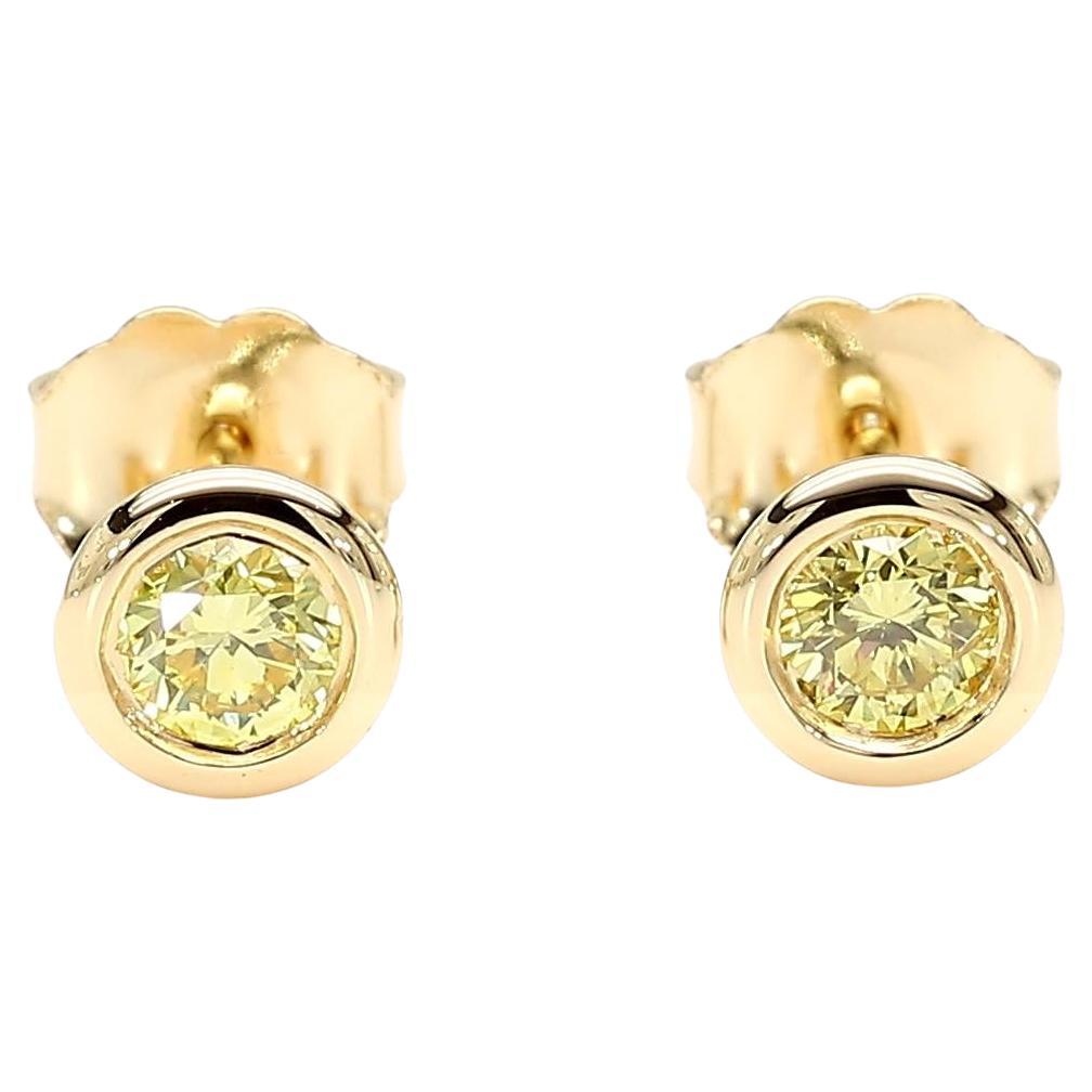 Orecchini con diamante rotondo giallo intenso Nature 0,30 carati TW in oro giallo in vendita