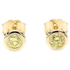 Orecchini con diamante rotondo giallo intenso Nature 0,30 carati TW in oro giallo