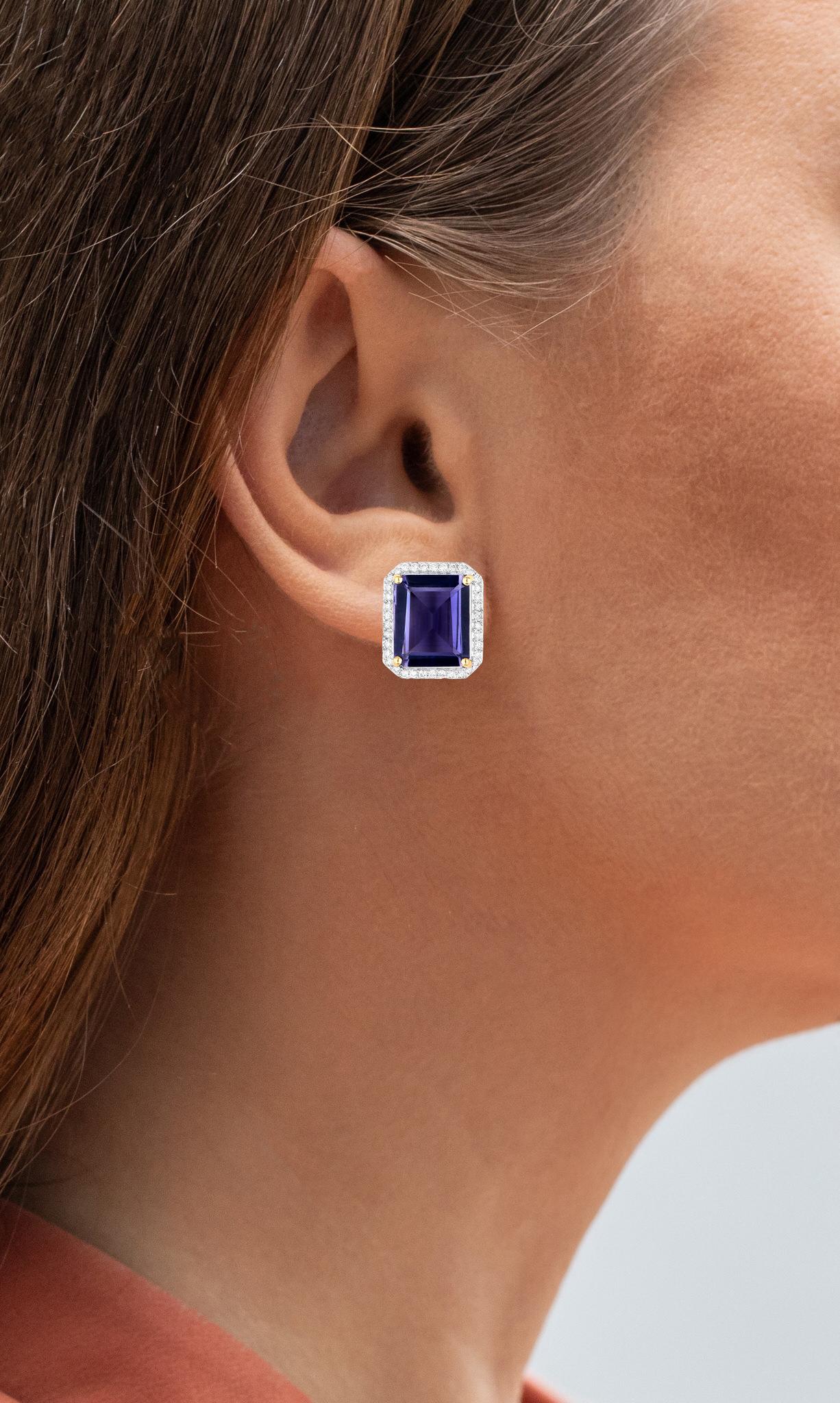 It comes with the Gemological Appraisal by GIA GG/AJP
All Gemstones are Natural
2 Iolites = 6.82 Carats
76 Diamonds = 0.38 Carats
Metal: 14K White Gold
Post With Friction Back
Dimensions: 14 x 12 mm