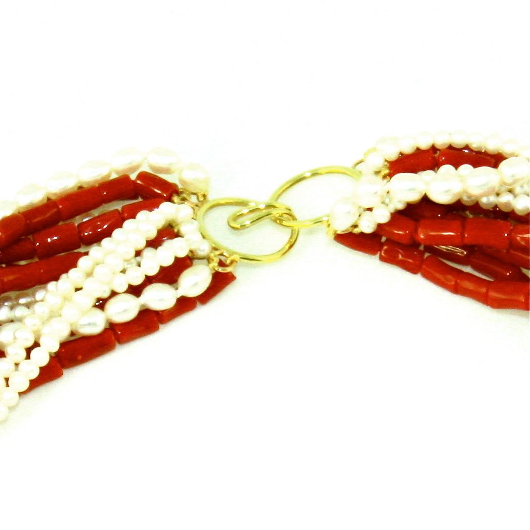 Outstanding 8-strand natural Italian red coral and 8-strand seed pearl necklace together making a 16-strand toursade necklace with a handmade 18k gold hook and eye clasp is an exclusive creation that anyone would be extremely happy to own!  Own it