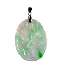 Pendentif en jade naturel sculpté avec tigre, prunes et pies