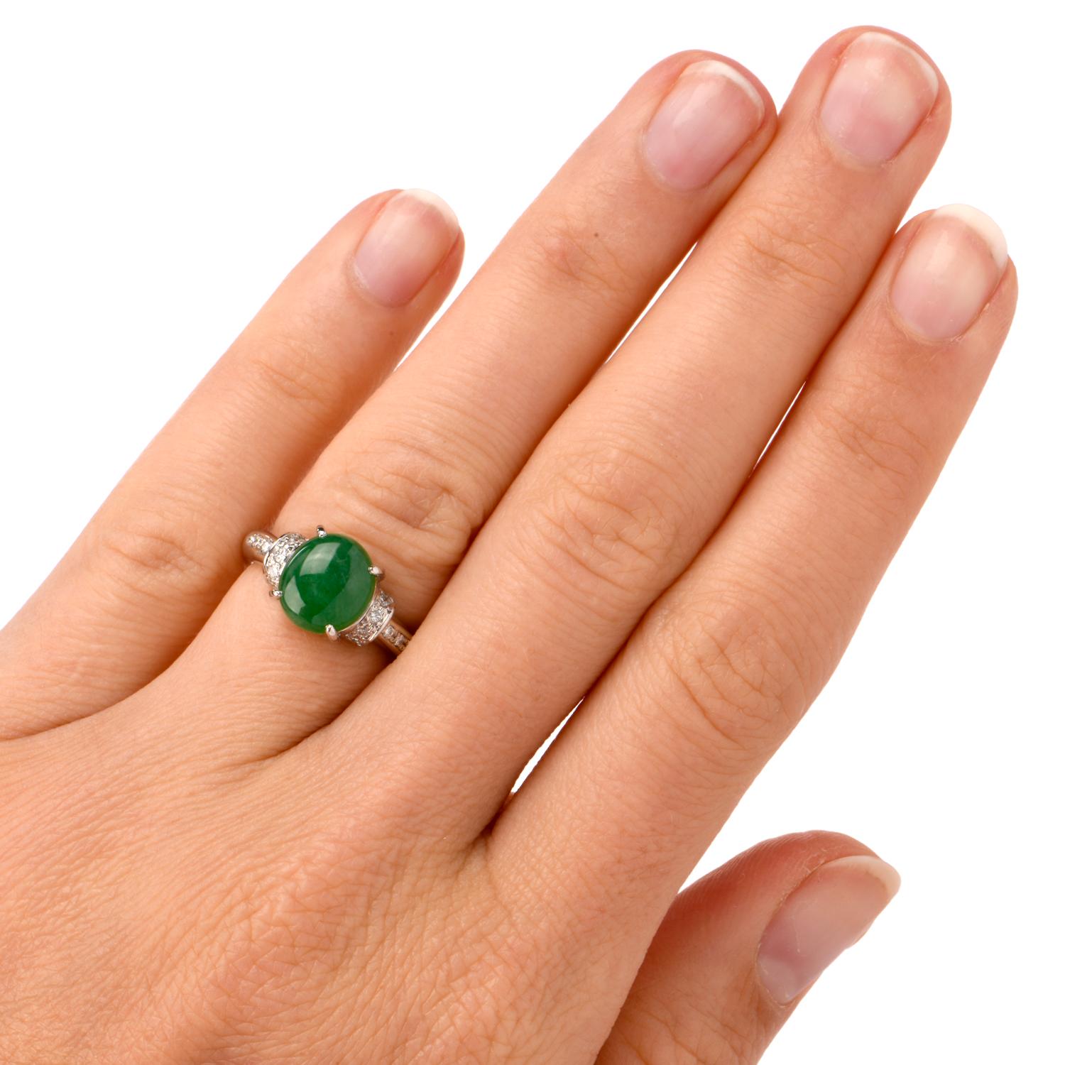 This alluring all natural jade without any treatments and diamond ring is crafted in solid platinum, weighing 7.0 grams and measuring 9mm wide x 9mm high. Centered with one GIA lab reported paw-prong-set oval shaped genuine jadeite jade cabochon,
