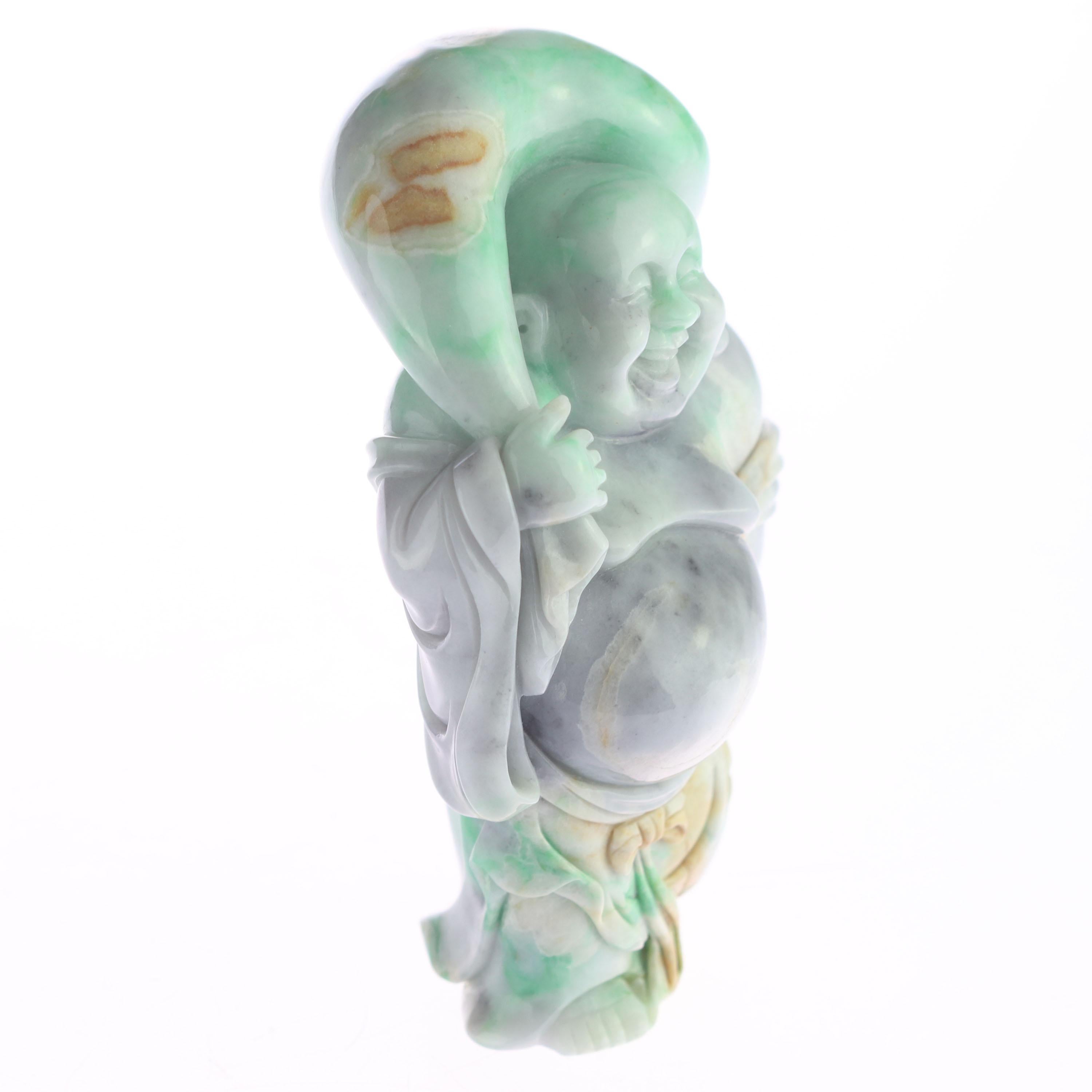 An antique and exceptional work of art dating back to the beginning of the 20th century. A unique masterpiece, a legacy of the Chinese craft of natural hade. Natural Type A Jadeite stunning Buddha statue. A passionate piece of traditional Buddhist