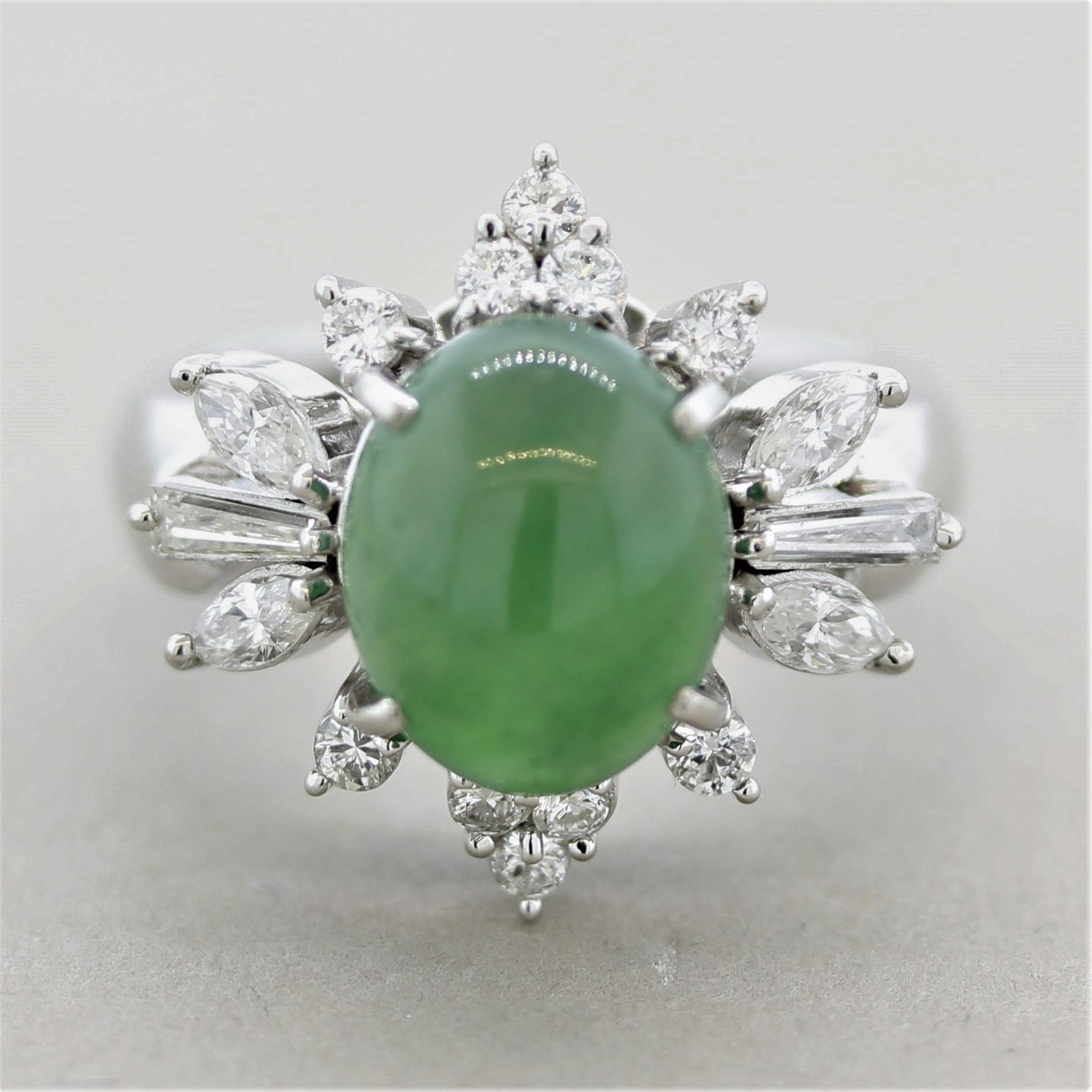 A lovely floral designed ring featuring a 4.36 carat jadeite jade. The jade is natural/untreated and certified by the GIA. It has an even green color and is translucent making the stone appear to glow under a light! It is accented by 0.74 carats of