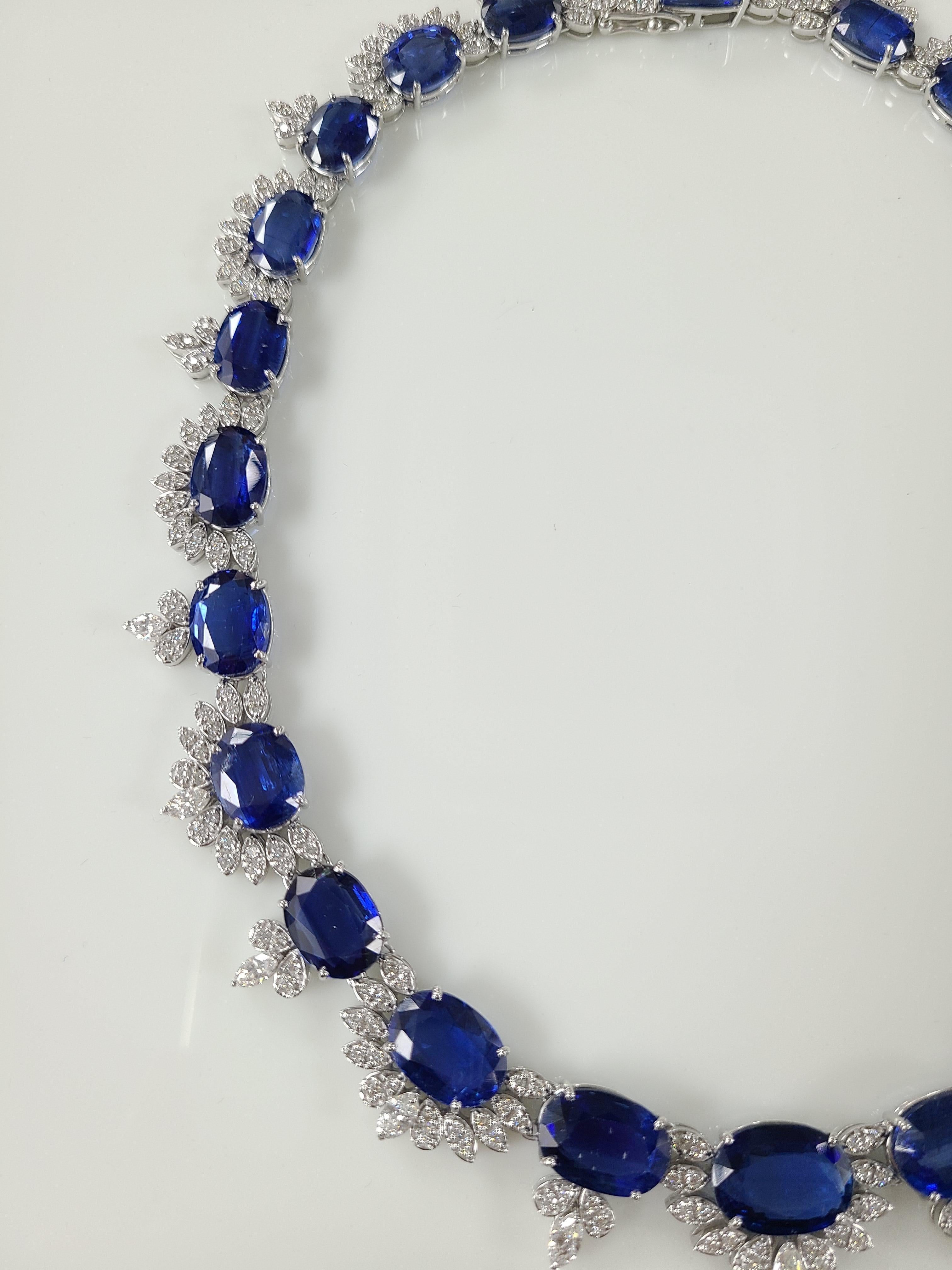 A beautiful and Classic design necklace of Natural Kyanite set in 18k white gold with diamonds . Kyanite is a natural stone and the combined weight of Kyanite in the necklace is 125.82 carats and Diamond weight is 5.96 carats . The necklace length