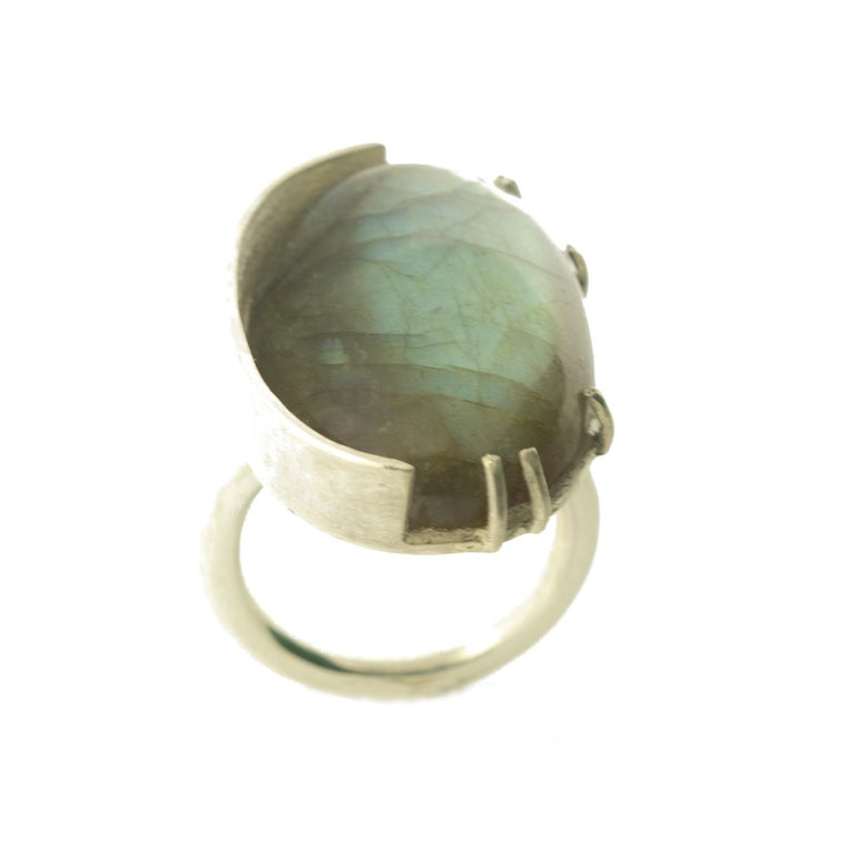Artistry ring, 100% Handmade in Italy with high quality semi-precious stone.

• 925 Sterling Silver
• Chalcedony Oval Cabochon 2.8 x 2.0 cm, 45 carats
• Total weight 22.2 g
• Size: 6.5 (US), 13 (France),  53 (Italy). Size can be re-adjusted

Please