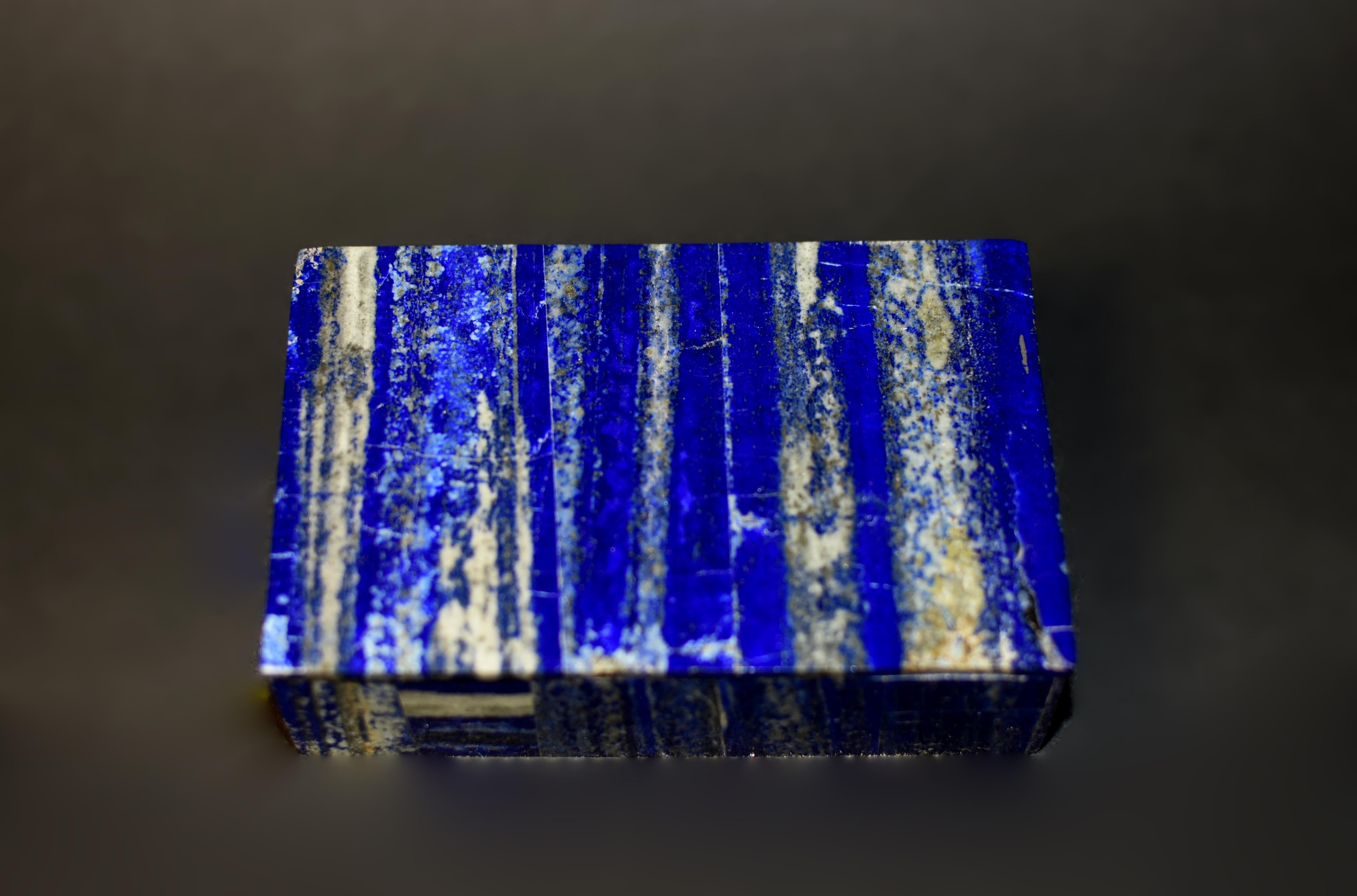 A beautiful vintage natural lapis box. Crafted from the finest grade AAA natural lapis lazuli, the box uses carefully selected pieces resembling a forest of trees against blue skies. Saturated cobalt blue with splendid gold sparkles. Interior with