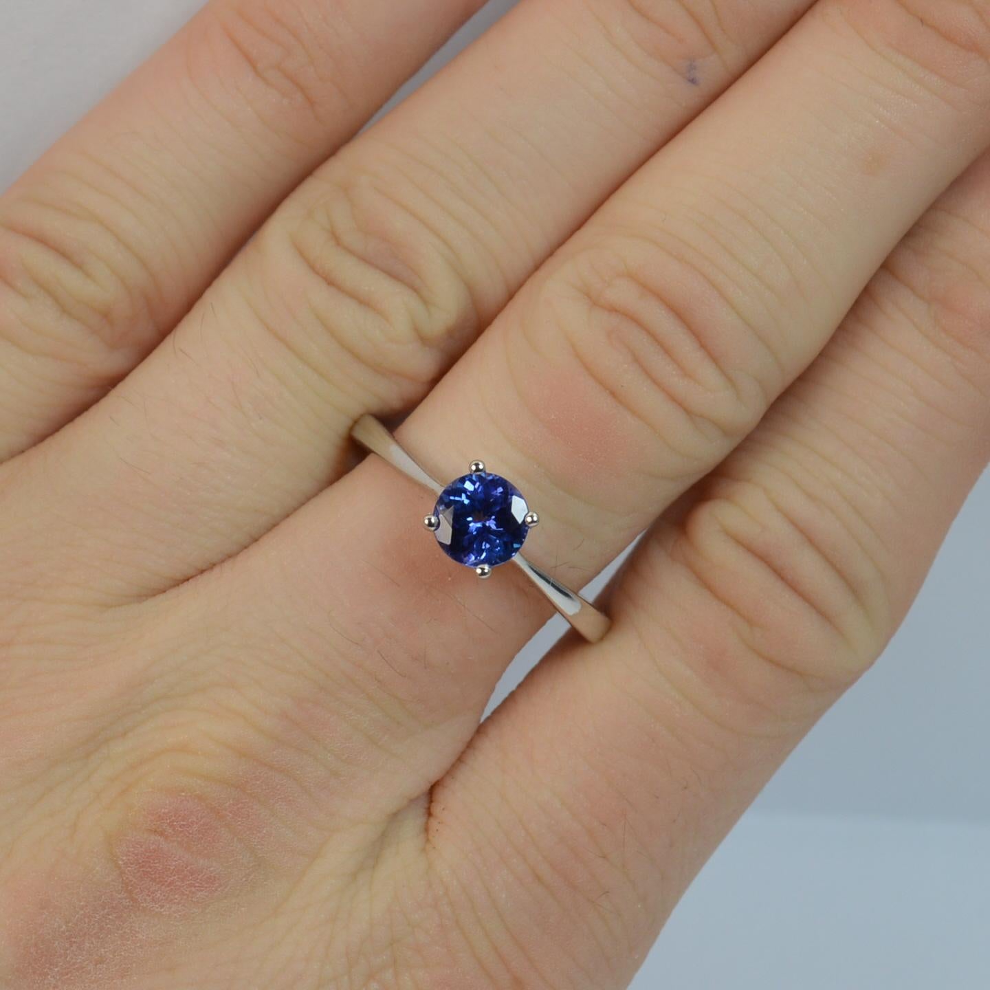 
A superb ladies Tanzanite ring.

Solid 18 carat white gold shank and setting.

​Designed with a natural round cut tanzanite to the centre in a four claw mount. 6.1mm diameter natural stone.

AAA tanzanite, a beautiful colour.



CONDITION ;