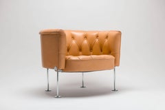 Fauteuil Club en cuir touffeté de Robert & Trix Haussmann